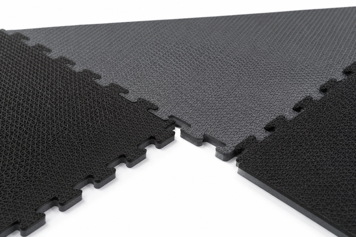 Close-up of interlocking foam play mat edges showing puzzle connection