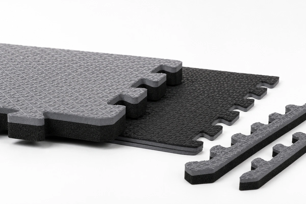 Foam play mat thickness comparison showing 1/2 inch versus 3/4 inch interlocking tiles